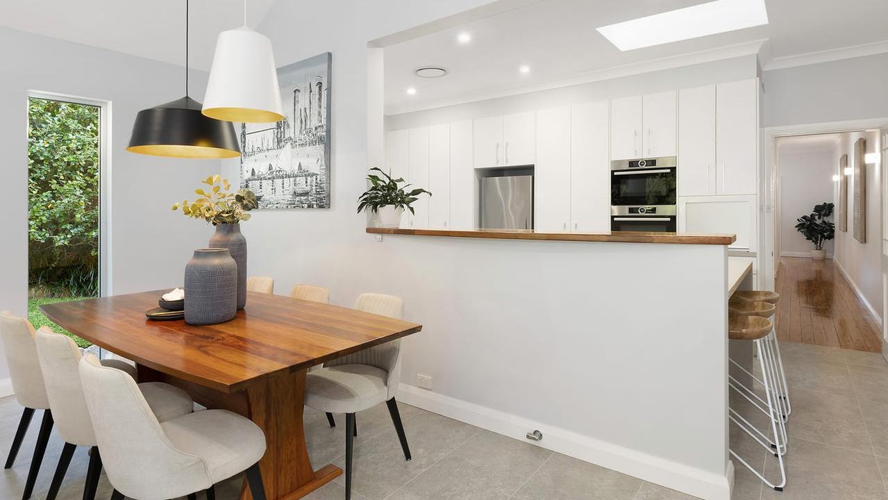 A stylish kitchen and family dining.