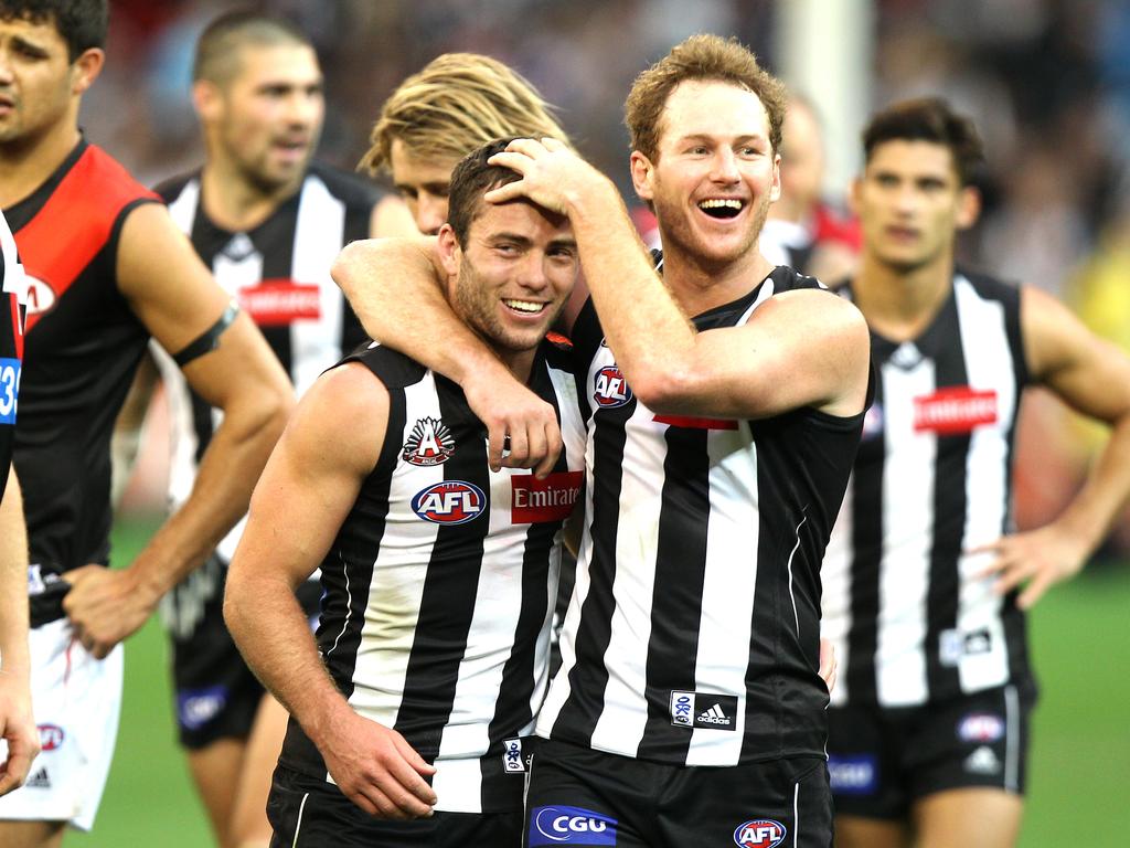 2012 - Ben Johnson and Jarryd Blair celebrate Collingwood’s sixth win in seven years.