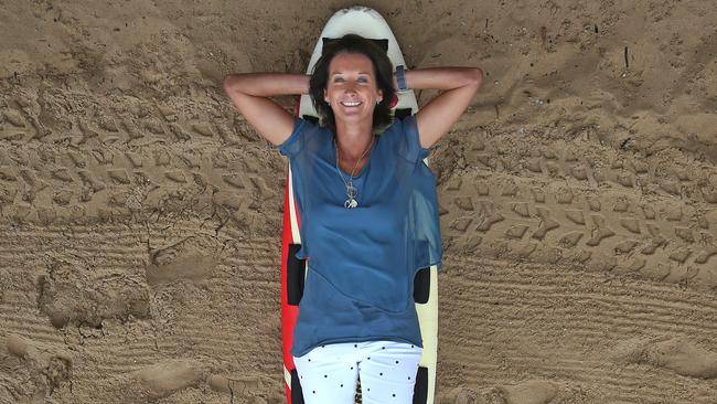 Former surfing world champ Layne Beachley pictured at Manly beach. Picture: Toby Zerna