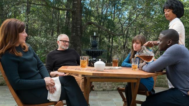 Missy (played by Catherine Keener), Dean (Bradley Whitford), Rose (Allison Williams), Georgina (Betty Gabriel) and Chris (Daniel Kaluuya) in a scene from Get Out.