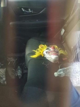 A clown mask allegedly found inside the stolen vehicle at Nerang. Picture: Supplied.