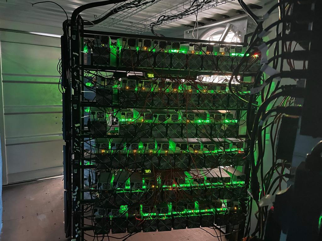 Profitably creating, or mining, bitcoin and other cryptocurrencies requires masses of computers dedicated to guessing lengthy hexadecimal numbers. (Photo by AFP)