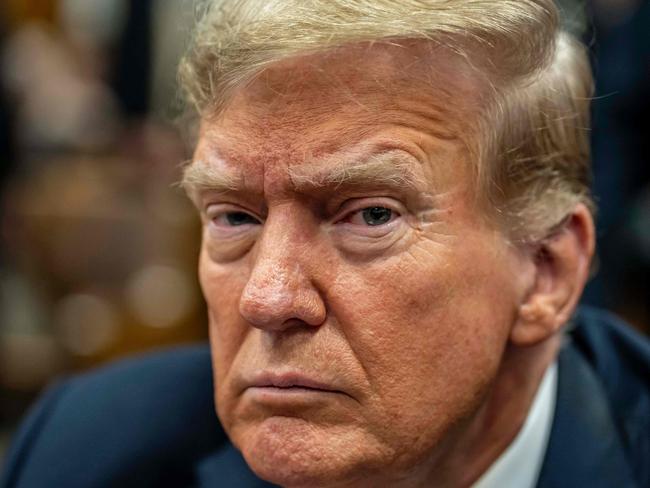 Former US President and Republican presidential candidate Donald Trump attends his trial for allegedly covering up hush money payments linked to extramarital affairs, at Manhattan Criminal Court in New York City, on May 21, 2024. After approximately five weeks, 19 witnesses, reams of documents and a dash of salacious testimony, the prosecution against Donald Trump rested its case May 20, 2024, handing over to the defense before closing arguments expected next week. (Photo by Mark Peterson / POOL / AFP)