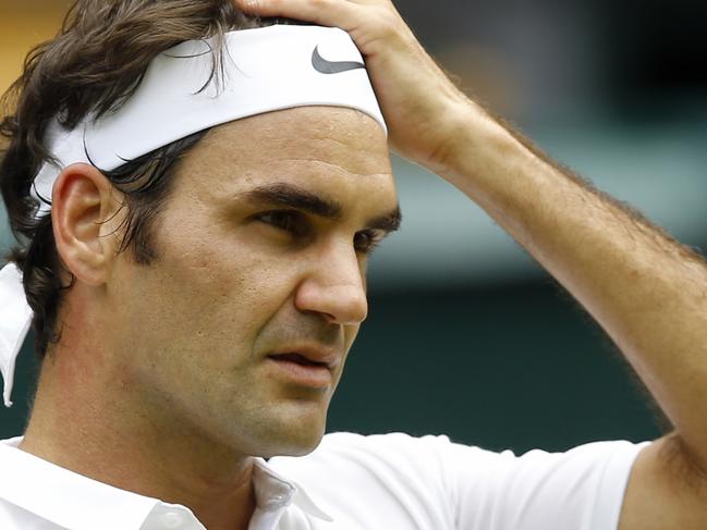 Roger Federer of Switzerland looks on during his men's singles match against Steve Johnson of the U.S on day eight of the Wimbledon Tennis Championships in London, Monday, July 4, 2016. (AP Photo/Kirsty Wigglesworth)