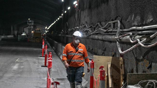 A construction worker is seen during construction of the WestConnex project. (AAP Image/Ben Rushton)