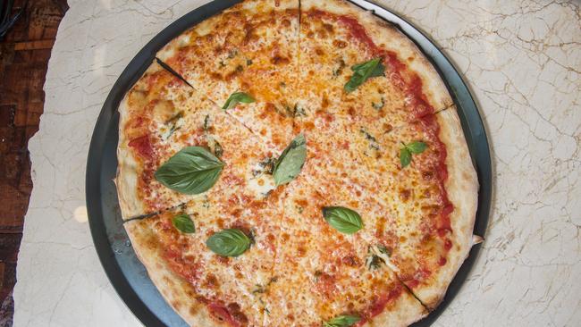 The New York Cheese pizza is loaded with mozzarella, cheddar, parmesan and taleggio.