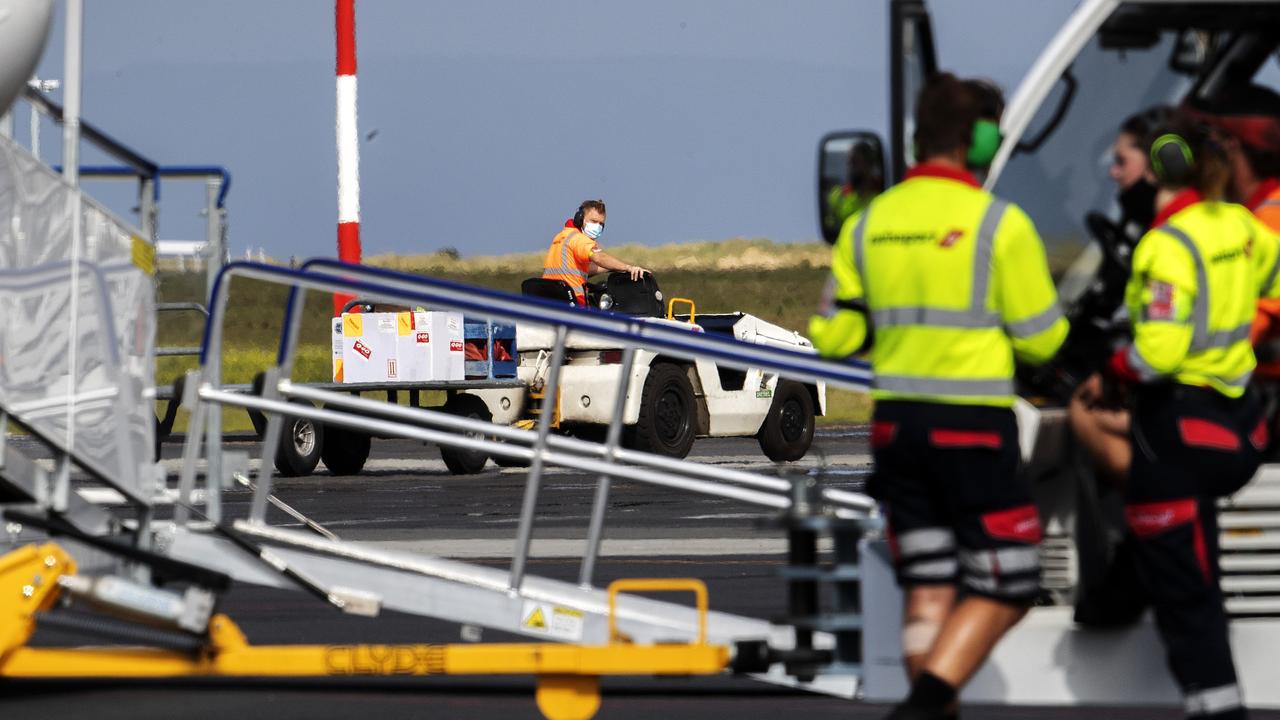 COVID-19 vaccinations arrive at Hobart on Qantas flight QF1023. Picture: Chris Kidd