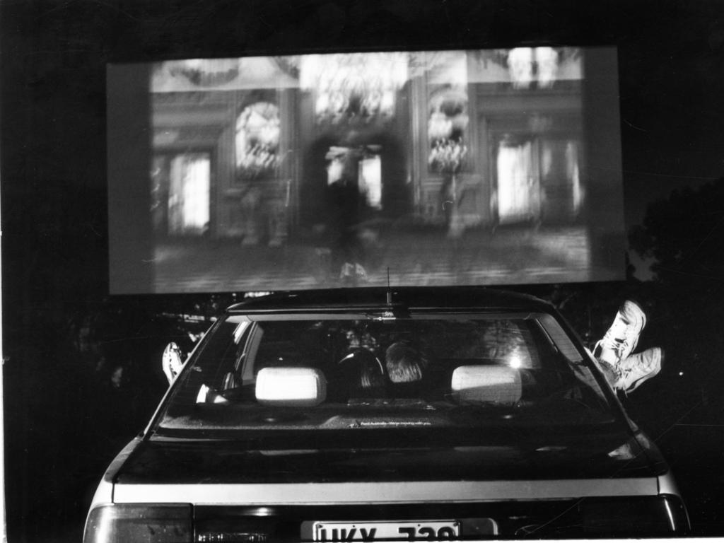 Nicole Newman and Kieron Curtis watching a screening of film ‘Home Alone 2’ at the Marion Twin drive-in on January 8, 1993. Picture: Brenton Edwards