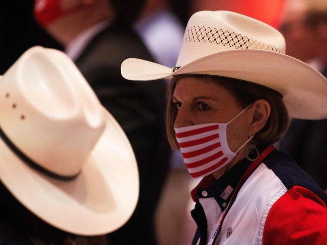 Delegates listen as President Donald Trump speaks during the first day of the Republican National Convention in Charlotte, North Carolina. Picture: AFP