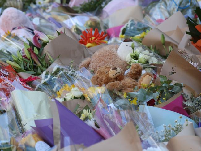 A flower memorial in Bourke St to remember those killed and injured on Friday. Picture: David Crosling