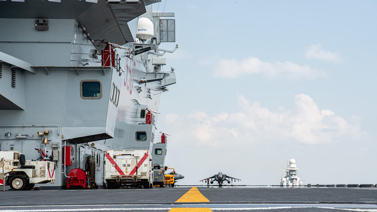 Just minutes after landing on board, sailors cleared the deck to await their next arrival. Picture: Pema Tamang Pakhrin