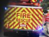 Streets blocked off as firefighters battle house blaze