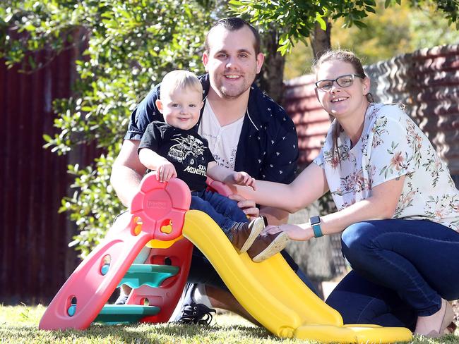 Karen Christiansen, 26, with baby Zavier Hamilton and partner Zak Hamilton. Karen has donated 240 litres of her breast milk to the Queensland Milk Bank. It's the biggest donation to the bank to date. Picture: Richard Gosling