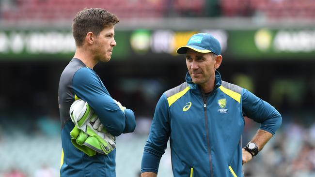 Australian captain Tim Paine is seen with coach Justin Langer (right) prior to play on day three of the first Test match between Australia and India at the Adelaide Oval in Adelaide, Saturday, December 8, 2018. (AAP Image/Dave Hunt) NO ARCHIVING, EDITORIAL USE ONLY, IMAGES TO BE USED FOR NEWS REPORTING PURPOSES ONLY, NO COMMERCIAL USE WHATSOEVER, NO USE IN BOOKS WITHOUT PRIOR WRITTEN CONSENT FROM AAP