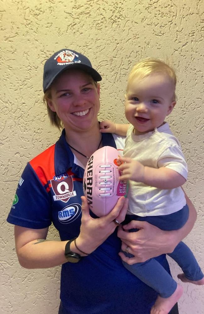 Curra Swans coach Meg Greenland with her daughter Olivia, 10 months. Picture: Supplied