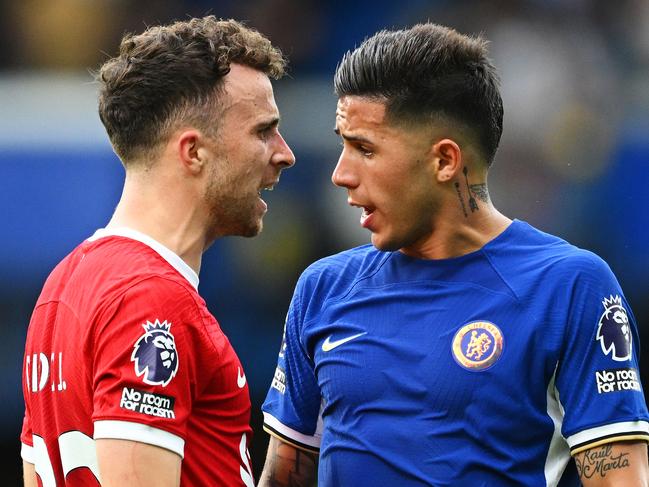 LONDON, ENGLAND - AUGUST 13: Diogo Jota of Liverpool clashes with Enzo Fernandez of Chelsea during the Premier League match between Chelsea FC and Liverpool FC at Stamford Bridge on August 13, 2023 in London, England. (Photo by Clive Mason/Getty Images)