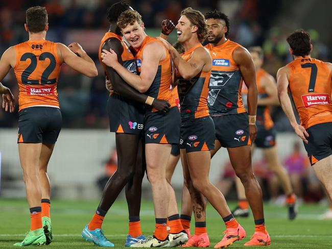 CANBERRA, AUSTRALIA - APRIL 25: Tom Green of the Giants celebrates a goal during the round seven AFL match between Greater Western Sydney Giants and Brisbane Lions at Manuka Oval on April 25, 2024 in Canberra, Australia. (Photo by Jason McCawley/AFL Photos/via Getty Images )