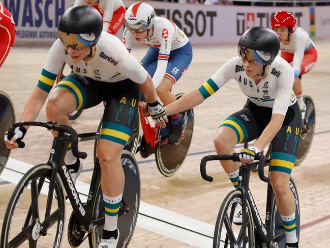 Australia's Amy Cure and Australia's Annette Edmondson hand over during the women's 30km Madison final at the UCI track cycling World Championship at the velodrome in Berlin on February 29, 2020. (Photo by Odd ANDERSEN / AFP)