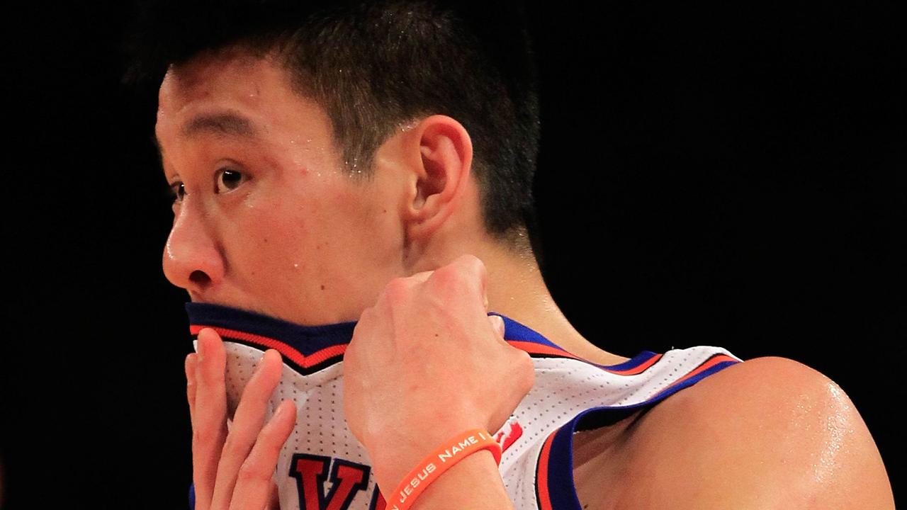 Jeremy Lin #17 of the New York Knicks looks on during the game against the New Jersey Nets at Madison Square Garden on February 20, 2012 in New York City. NOTE TO USER: User expressly acknowledges and agrees that, by downloading and/or using this Photograph, user is consenting to the terms and conditions of the Getty Images License Agreement. Chris Trotman/Getty Images/AFP== FOR NEWSPAPERS, INTERNET, TELCOS & TELEVISION USE ONLY ==