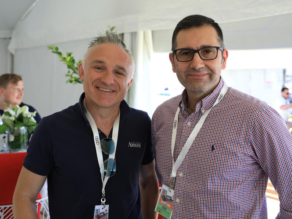 John Dagas and Bill Pantelis were among the VIP Audi Solitaire customers who viewed the Adelaide Motorsport Festival track side. Picture: Kane Overall