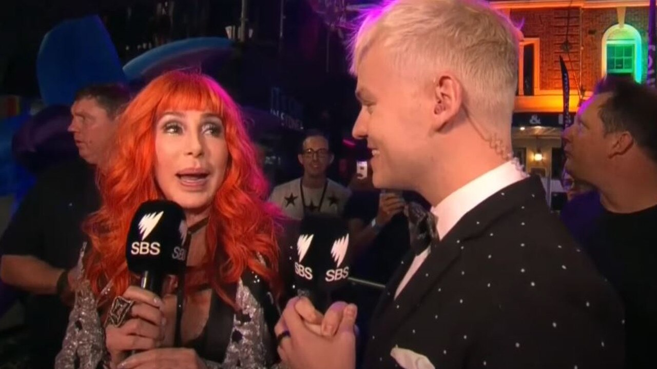 Joel Creasey chatting to Cher at Mardi Gras.