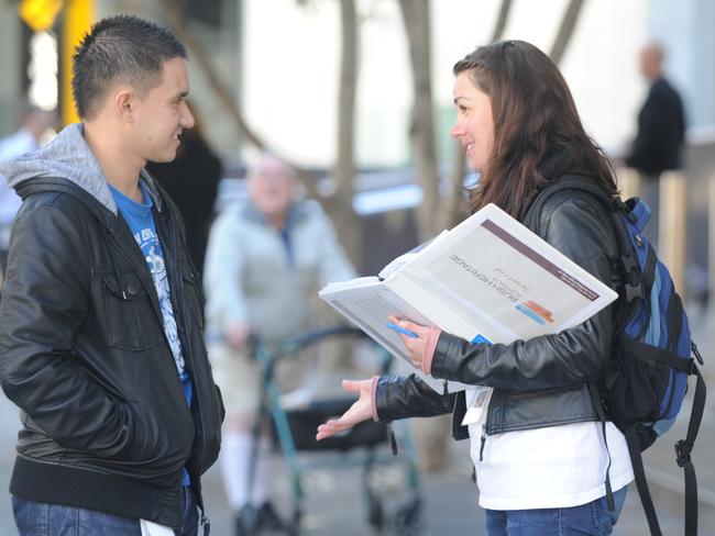 A chugger asks for donations in the Perth CBD.