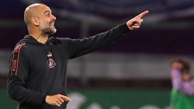 Manchester City Pep Guardiola gestures on the touchline Picture: AFP.
