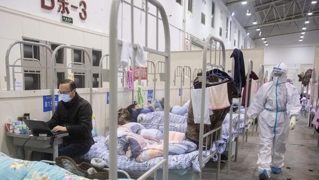 Patients at an exhibition centre converted into a hospital in Wuhan in China's central Hubei province. Picture: AFP