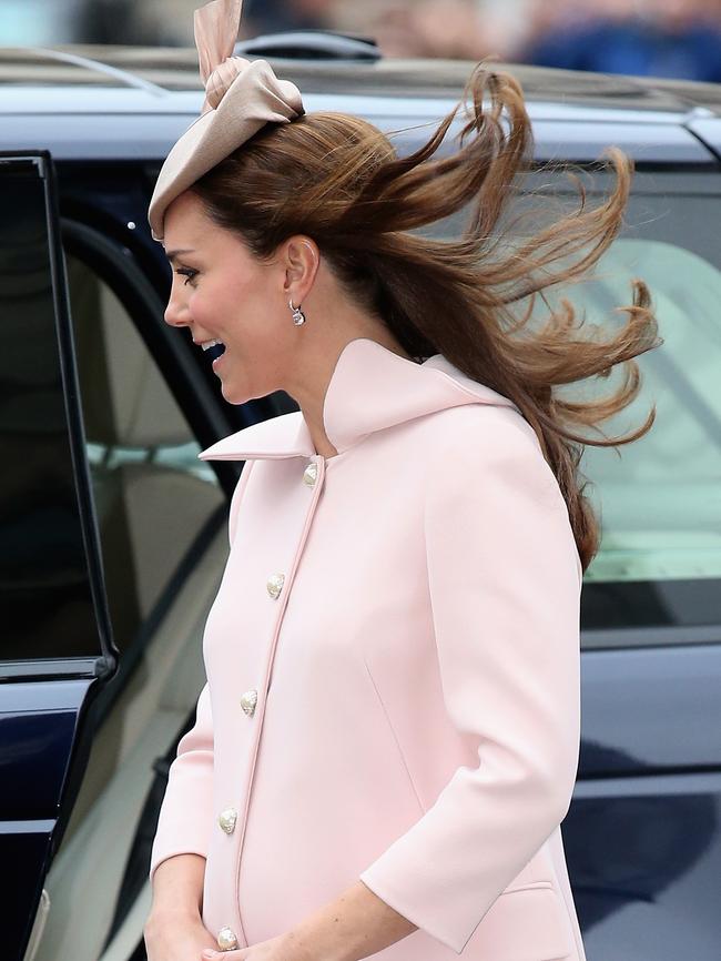 Pregnant Kate Middleton covered her baby bump with a pale pink coat. Picture: Chris Jackson/Getty Images
