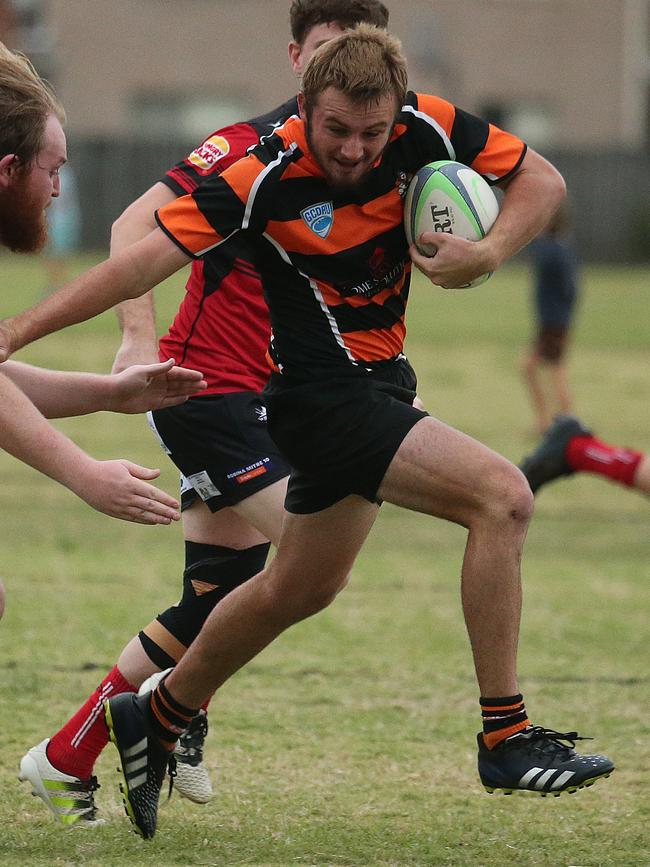 Gold Coast District Rugby Union clash between Coomera Crushers and Griffith Uni Colleges Knights. Played at Coomera. Coomera Player No6 Kai Wallis Griffith uni Player No Pic Mike Batterham