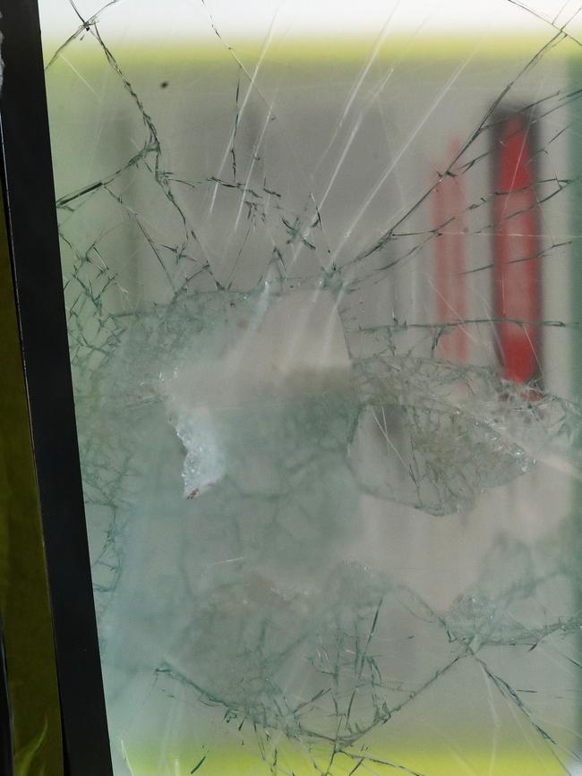 Broken glass windows and door at Grubbies, Redbank Plains. Picture: Liam Kidston