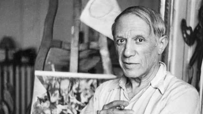 Pablo Picasso poses in his Paris studio. Picture: Getty Images