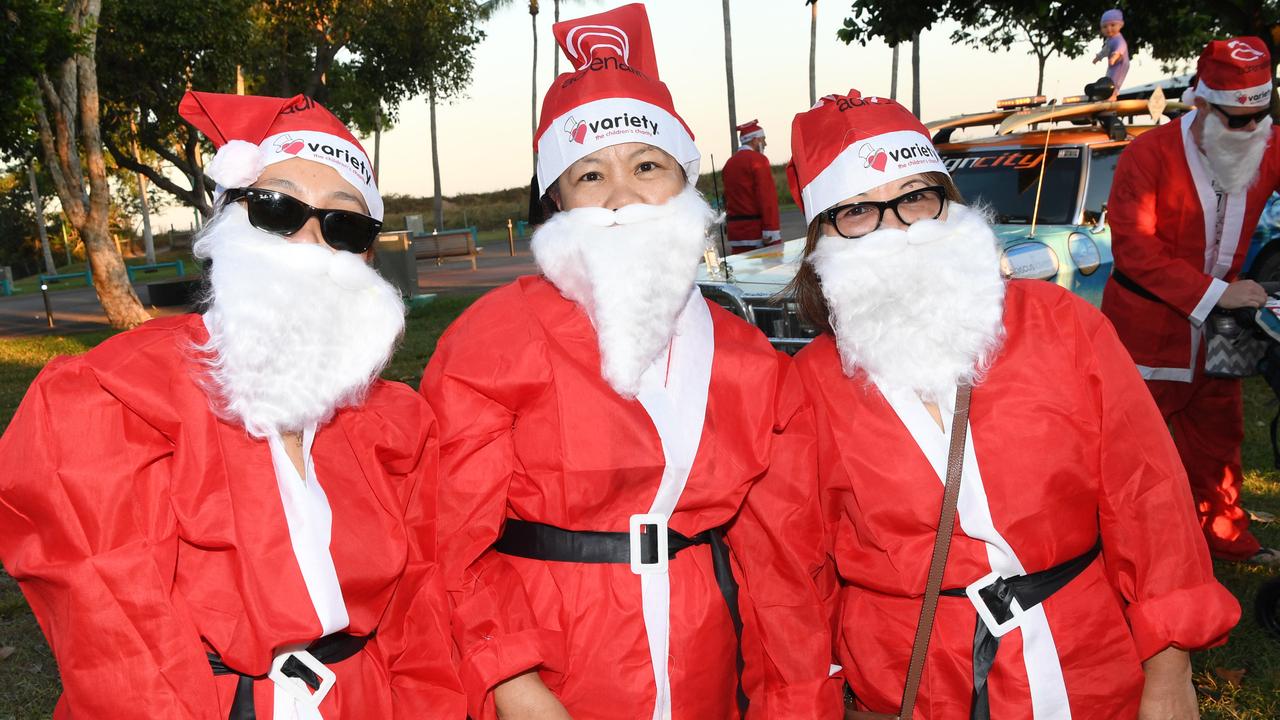 Lorena Villarosa, Cathy Rice and Marichu King at the Darwin Santa Fun Run in July at Mindil Beach. Picture Katrina Bridgeford