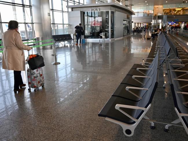 Madrid’s airport is deserted as Spain recorded hundreds of new coronavirus infections. Picture: AFP