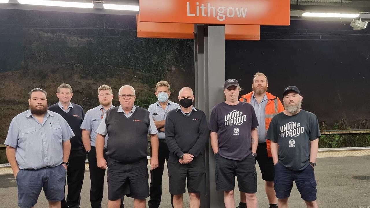 Rail staff and union members walk off the job in Lithgow.