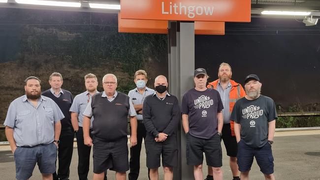 Rail staff and union members walk off the job in Lithgow.