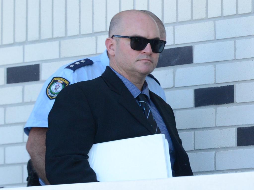 Senior Constable Michial Luke Greenhalgh, 39, leaves Lismore Local Court after the first four days of a hearing during which he has been defending a charge of common assault. The hearing will continue in the new year. Picture: Liana Boss