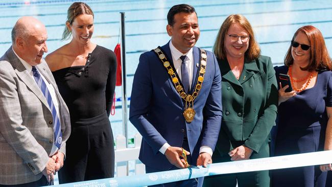 Parramatta Lord Mayor Sameer Pandey cuts the ribbon at the pool with councillor Paul Noack, Olympian Emma McKeon, Parramatta state Labor MP Donna Davis and councillor Kellie Darley. Picture: David Swift