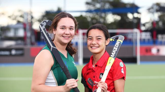 Brothers TAS's Emma Lyle and Souths Melanie Lum faced off in the Under 18B Girl's grand final . PICTURE: BRENDAN RADKE