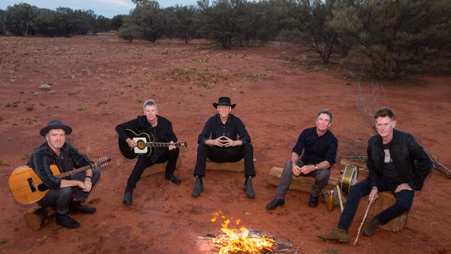 Midnight Oil photographed in the Uluru-Kata Tjuta National Park, Northern Territory in December 2016. L-R: Jim Moginie (guitar/keys), Martin Rotsey (guitar), Peter Garrett (vocals), Rob Hirst (drums/vocals) and Bones Hillman (bass/vocals). Picture: Oliver Eclipse