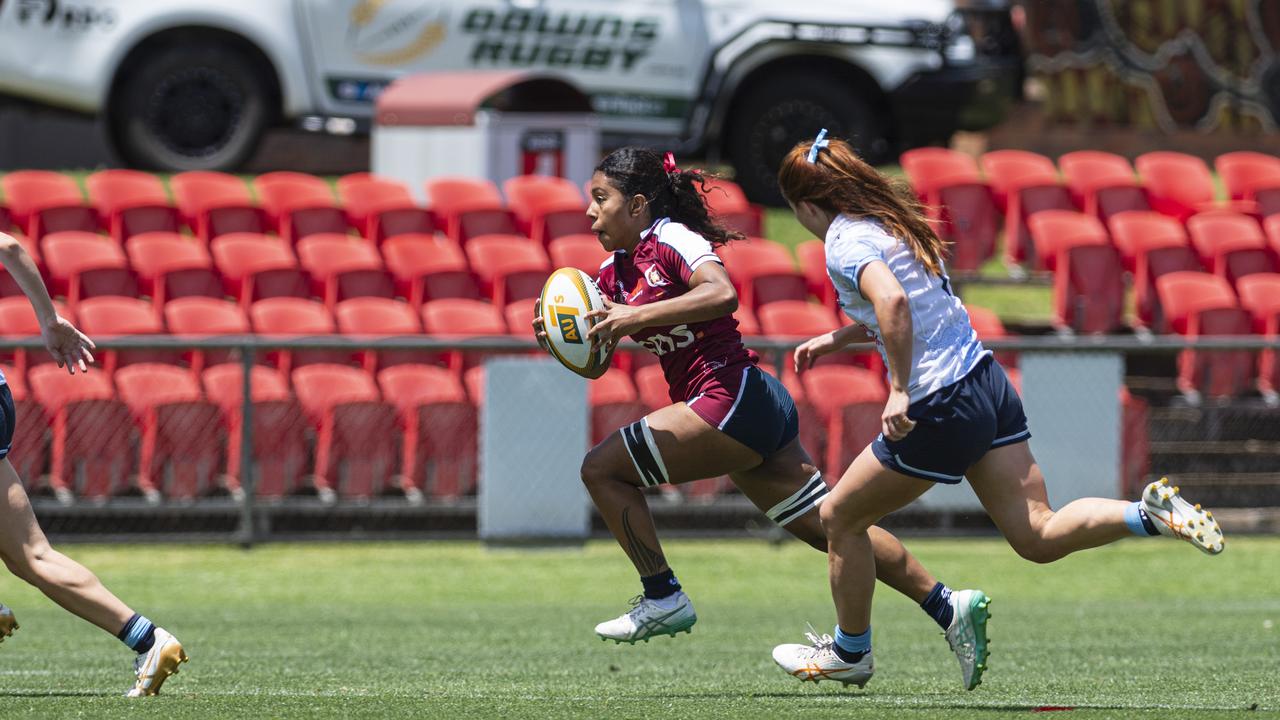 Fleur Ginn on the way to try for Queensland Reds as Downs Rugby host Next Gen 7s at Toowoomba Sports Ground, Saturday, October 12, 2024. Picture: Kevin Farmer