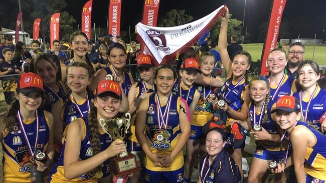 Jindalee Jags Mia Beran, middle with cup, was joint player of the year in her age group - and also a premiership winner.