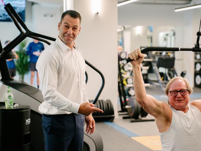 Dean Solomon gives Kevin Sheedy a workout