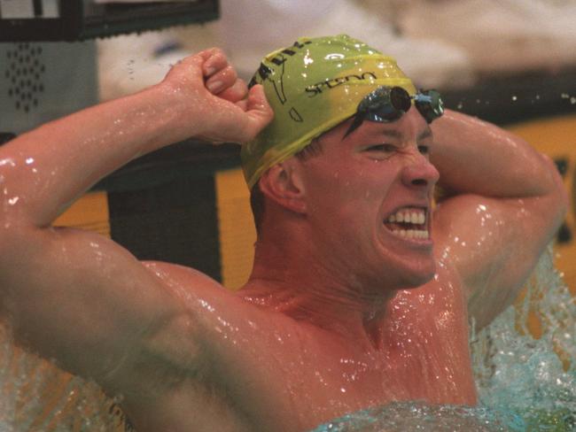 24 AUG 1994:  KIEREN PERKINS OF AUSTRALIA CELEBRATES AFTER WINNING GOLD IN THE MENS 1500M FREESTYLE IN A NEW WORLD RECORD TIME OF 15MINS 12.90 SECS  AT THE 1994 COMMONWEALTH GAMES IN VICTORIA , B.C, CANADA. Mandatory Credit: Stephen Dunn/ALLSPORT..FEE APPLIES...ONE TIME USE...