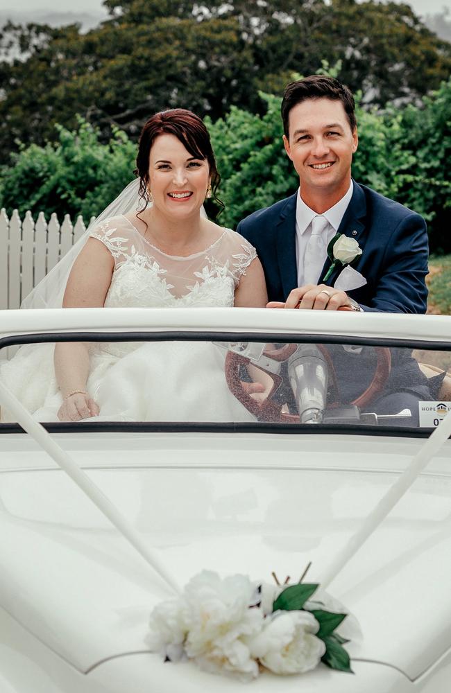 Former Gympie couple Tara and Michael Hansen in the "wedding carriage" golf buggy at their dream wedding.