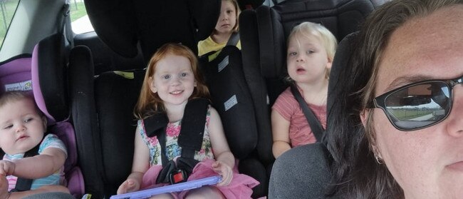 The Waite family waiting in line for PCR tests at Ipswich, Raceview on Monday, January 10. Picture: Supplied