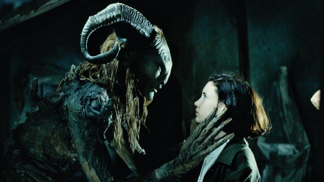 Ofelia (Ivana Baquero, left) in the underground labyrinth where she discovers the Faun (Doug Jones) in a scene from Guillermo del Toro's Pan's Labyrinth. Picture: Supplied