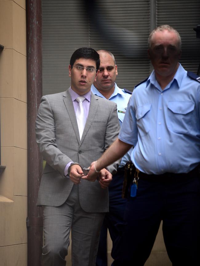 Christopher Estephan is led away by court officers. Photo Jeremy Piper