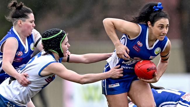 Sunbury Lions’ Audrey Follett can’t stop Giuseppina Tarantello of Coburg Districts. Picture: Andy Brownbill