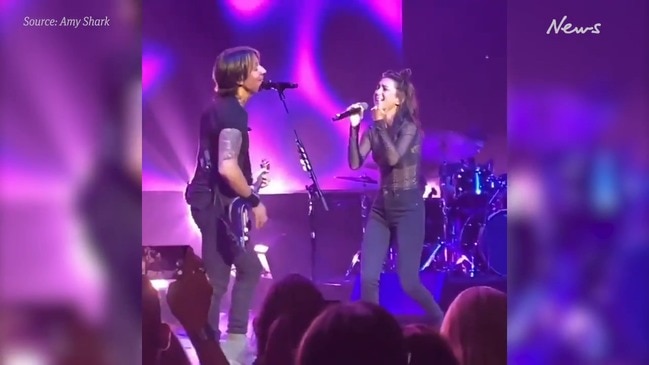 Keith Urban performs with Amy Shark